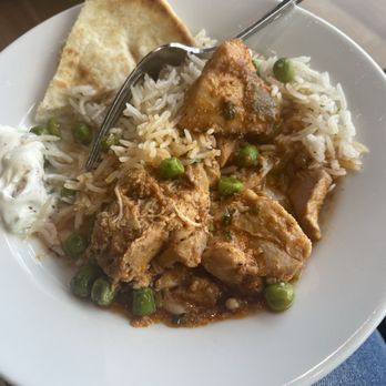 Turkish Airlines Lounge - Rice, peas, and stew chicken with pita & tzatziki sauce - Airport Lounges Near Me - Dulles, Virginia