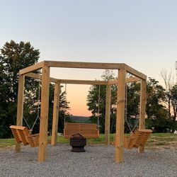 Hilltop Resorts and Campgrounds - Swing set & Community fire pit