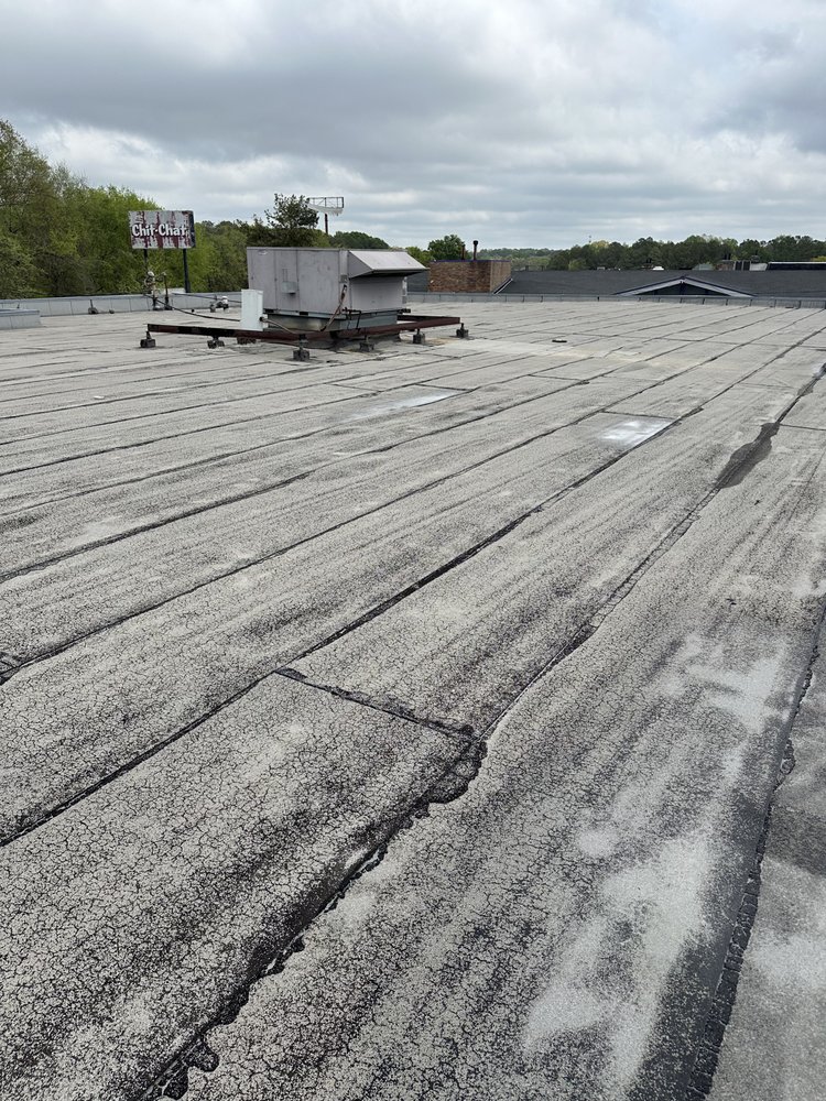 Slide of Capital Roofing