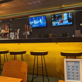 5411 Empanadas - Bar area with TV's and taps - Empanadas Near Me - Chicago, Illinois