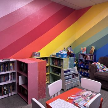 Thistle & Nightshade - A very fun kids room for reading and coloring. Love the rainbow wall. Julie A - Bookstores Near Me - Reno, Nevada