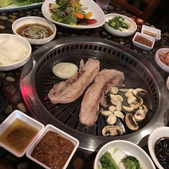 Ssambap Korean BBQ - Samgyupsal (pork belly) in addition to the complimentary side dishes and sauces that come to your table with their BBQ - Korean Near Me - Stony Brook, New York Ssambap Korean BBQ - Samgyupsal (pork belly) in addition to the complimentary side dishes and sauces that come to your table with their BBQ - Korean Near Me - Stony Brook, New York