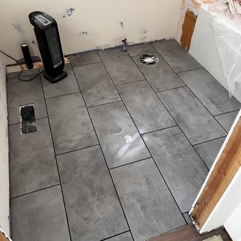 All Seasons Flooring & Construction - Spare bathroom floor 2 concrete ceramic. - Flooring Near Me All Seasons Flooring & Construction - Spare bathroom floor 2 concrete ceramic. - Flooring Near Me