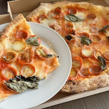 Comparu - Pepperoni pizza with, Basil, Mozzarella, olive oil - delicious. Looks and tastes just like the pizza we had in Rome, Italy last year. - Italian Near Me - Niagara Falls, Ontario