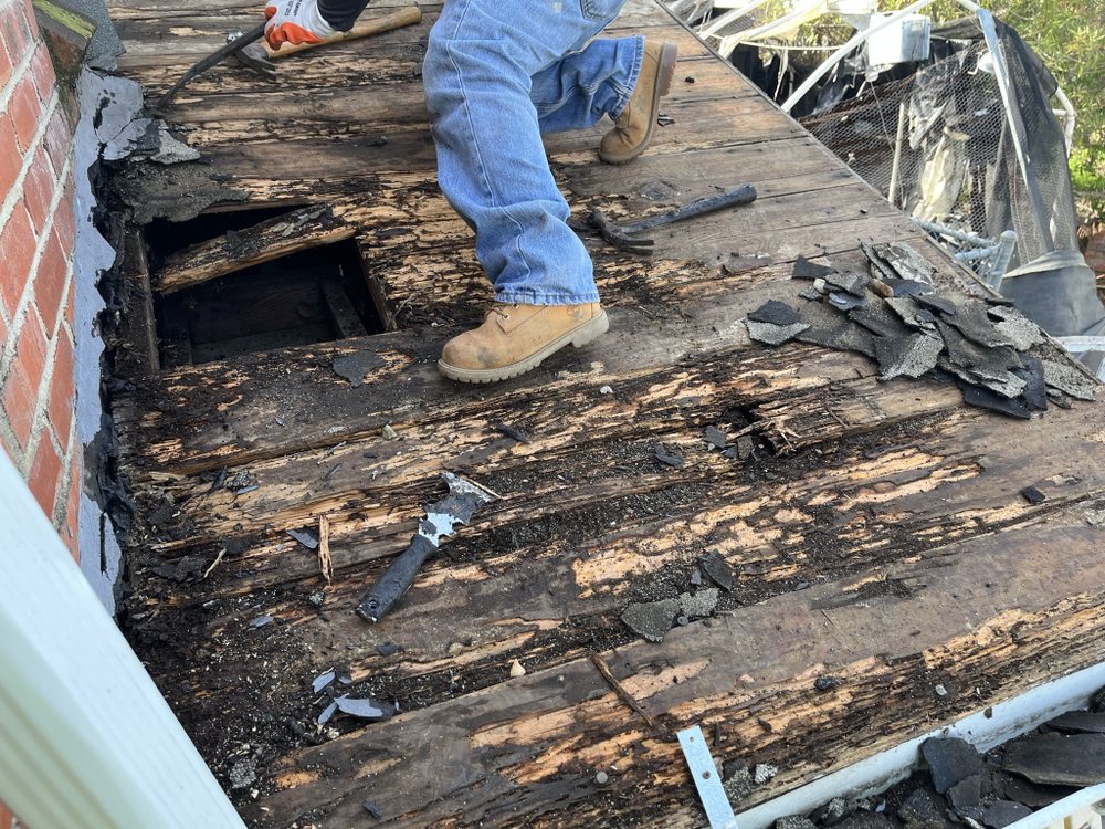 Slide of Nicks roofing and tree services