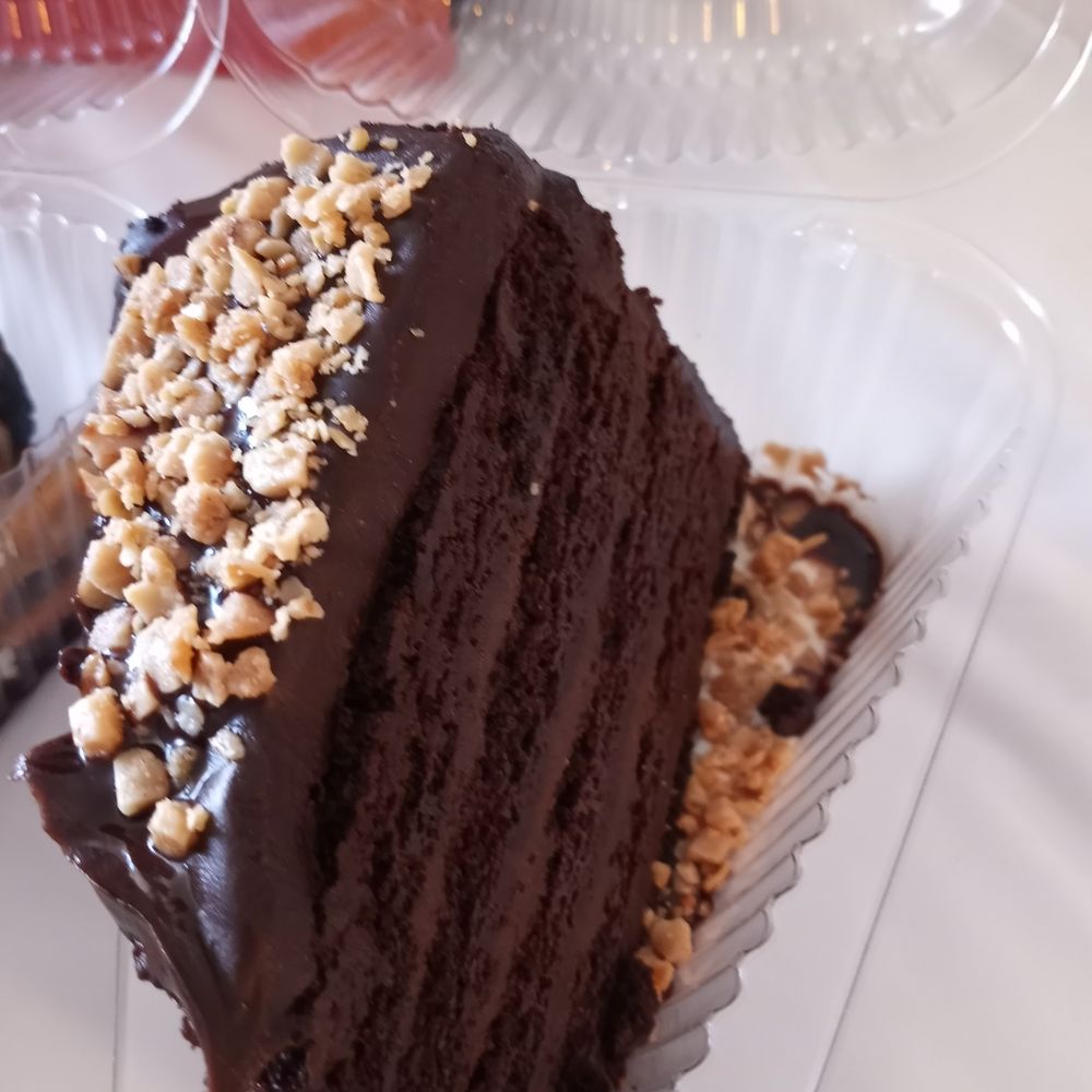 Guy Fieri's Flavortown Kitchen - Delicious chocolate layer cake - Food Delivery Services Near Me Guy Fieri's Flavortown Kitchen - Delicious chocolate layer cake - Food Delivery Services Near Me
