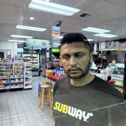 Chevron - Employee of gas station the gave me the double middle finger.