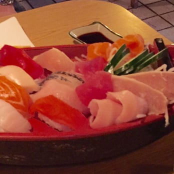 Azuma Sushi - Love Boat for 2: 8 piece Nigri & 8 piece Sashimi (pictured) plus Dynamite roll, tempura & miso soup. YUM - Sushi Bars Near Me - Seattle, Washington