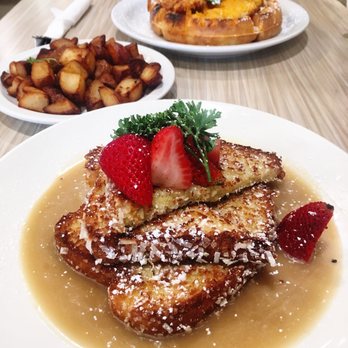 Stacks Pancake House - He got the spicy chicken and waffles, I got the coconut toffee French toast, and we HAD to get a side of potatoes just because - Breakfast & Brunch Near Me - Irvine, California Stacks Pancake House - He got the spicy chicken and waffles, I got the coconut toffee French toast, and we HAD to get a side of potatoes just because - Breakfast & Brunch Near Me - Irvine, California