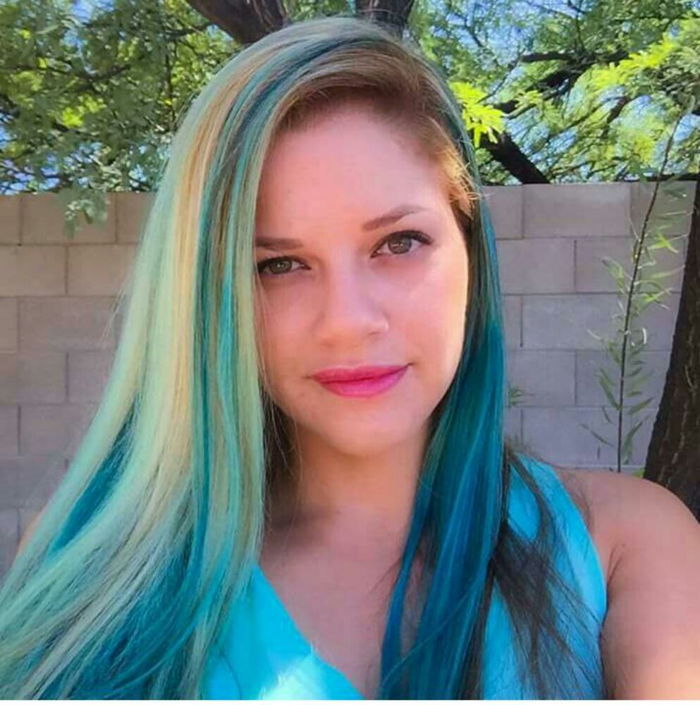 Teresa Motzkin - KC's Hair & More Logo