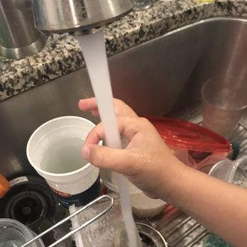 1st Home & Commercial Services - Water pressure. Our son having fun with the water - Plumbing Near Me - Austin, Texas