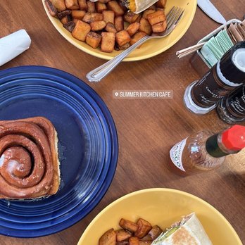 Summer Kitchen Cafe - South of the border wrap and Avocado wrap (roll up) with a cinnamon roll - Breakfast & Brunch Near Me - Rosemary Beach, Florida Summer Kitchen Cafe - South of the border wrap and Avocado wrap (roll up) with a cinnamon roll - Breakfast & Brunch Near Me - Rosemary Beach, Florida