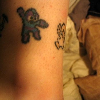 China Doll Tattoo & Piercing - Megaman with touchups by Jim - Tattoo Near Me - Hammond, Indiana