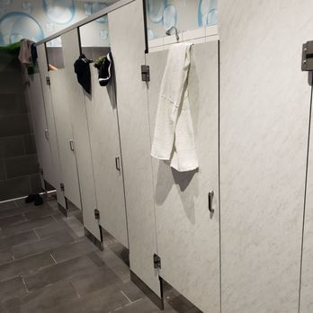 EōS Fitness - EoS shower doors without door hooks to hang your clothes or bags on. - Gyms Near Me - Sugar Land, Texas