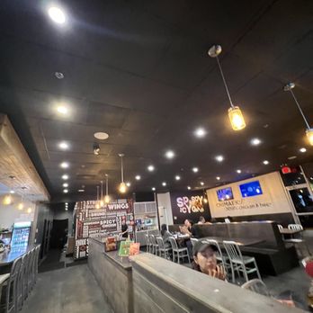 Bonchon - Casual atmosphere with TVs throughout. - Korean Near Me - Elk Grove, California