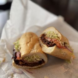 Tom's International Deli - BLT with Xtra American Cheese, onions & oil