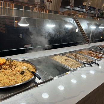 Dimassi's Buffet - The start of the hot foods with a display of different rice dishes - Buffets Near Me - Oceanside, California Dimassi's Buffet - The start of the hot foods with a display of different rice dishes - Buffets Near Me - Oceanside, California