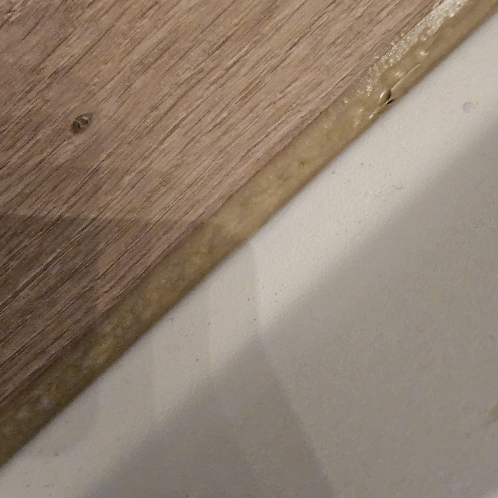 Anatom Restoration - Awful Grout job.  Doesn't match the floor or the tub.  And it's bubbled. - Damage Restoration Near Me - Centennial, Colorado