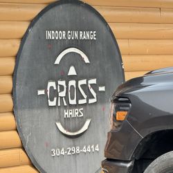 Cross Hairs Indoor Shooting Range - The sign out front of the range/store.