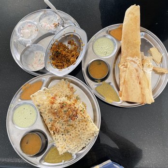 Madras Cafe - From Top left, clockwise: Kothu paratta, Special Vegetable Dosa, Special Rava Masala - Indian Near Me - Sunnyvale, California Madras Cafe - From Top left, clockwise: Kothu paratta, Special Vegetable Dosa, Special Rava Masala - Indian Near Me - Sunnyvale, California