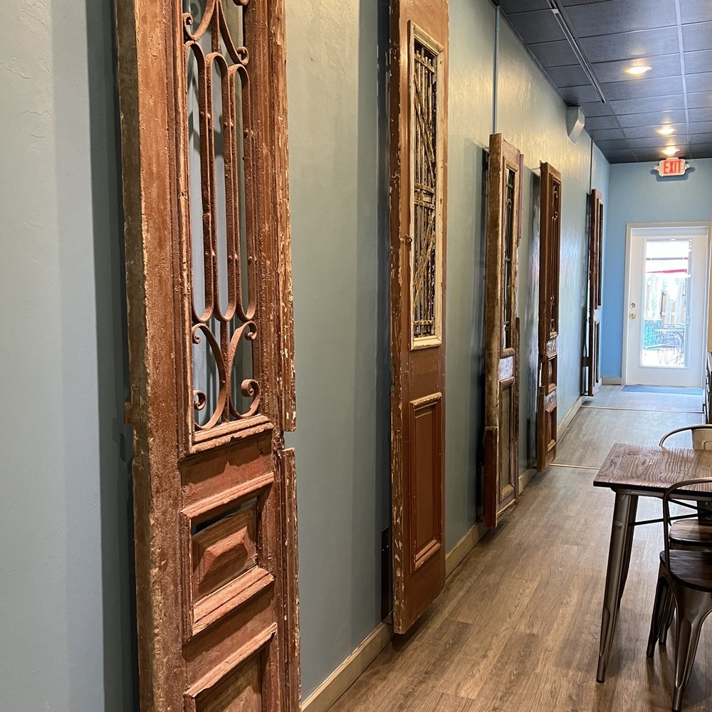 Spinwiches - a hallway with antique doors - Sandwiches Near Me - High Springs, Florida Spinwiches - a hallway with antique doors - Sandwiches Near Me - High Springs, Florida