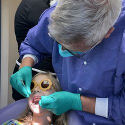 Copeland Gerald M II DMD - Dr. Jerry finding "wiggly" teeth!