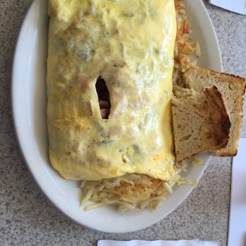 Beth's Cafe - This is the make it yourself omelette with bacon and ham, all you can hash browns and toast. $14.50 including tax. - American Near Me - Seattle, Washington Beth's Cafe - This is the make it yourself omelette with bacon and ham, all you can hash browns and toast. $14.50 including tax. - American Near Me - Seattle, Washington