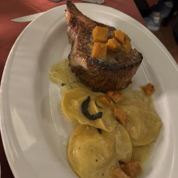Gaetano's - Kurobuta pork chop with ravioli (a daily special) - Italian Near Me - Henderson, Nevada Gaetano's - Kurobuta pork chop with ravioli (a daily special) - Italian Near Me - Henderson, Nevada