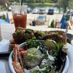 Shrimp Po' Boy, Side Salad with. Lue Cheese Dressing, and a Bloody Mary.