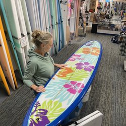 Ossie's Surf Shop - Tammy seeing her custom Al Merrick Performer longboard for the first time.