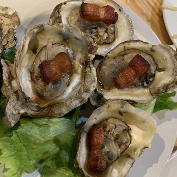 Plums - Oysters but really it's the bacon that makes this a good dish. - Seafood Near Me - Beaufort, South Carolina Plums - Oysters but really it's the bacon that makes this a good dish. - Seafood Near Me - Beaufort, South Carolina