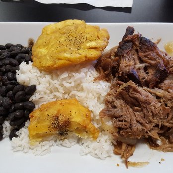 Chez Quan's - Pernil with rice and black beans and tostones. Very good. - Thai Near Me - Melbourne, Florida