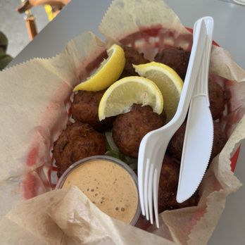 Tide Tables - Conch fritters - Seafood Near Me - Cortez, Florida