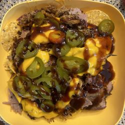 Smokin Hot Butts - Pig -out nachos pulled pork , jalapeño, cheese sauce, bbq sauce Mac and cheese