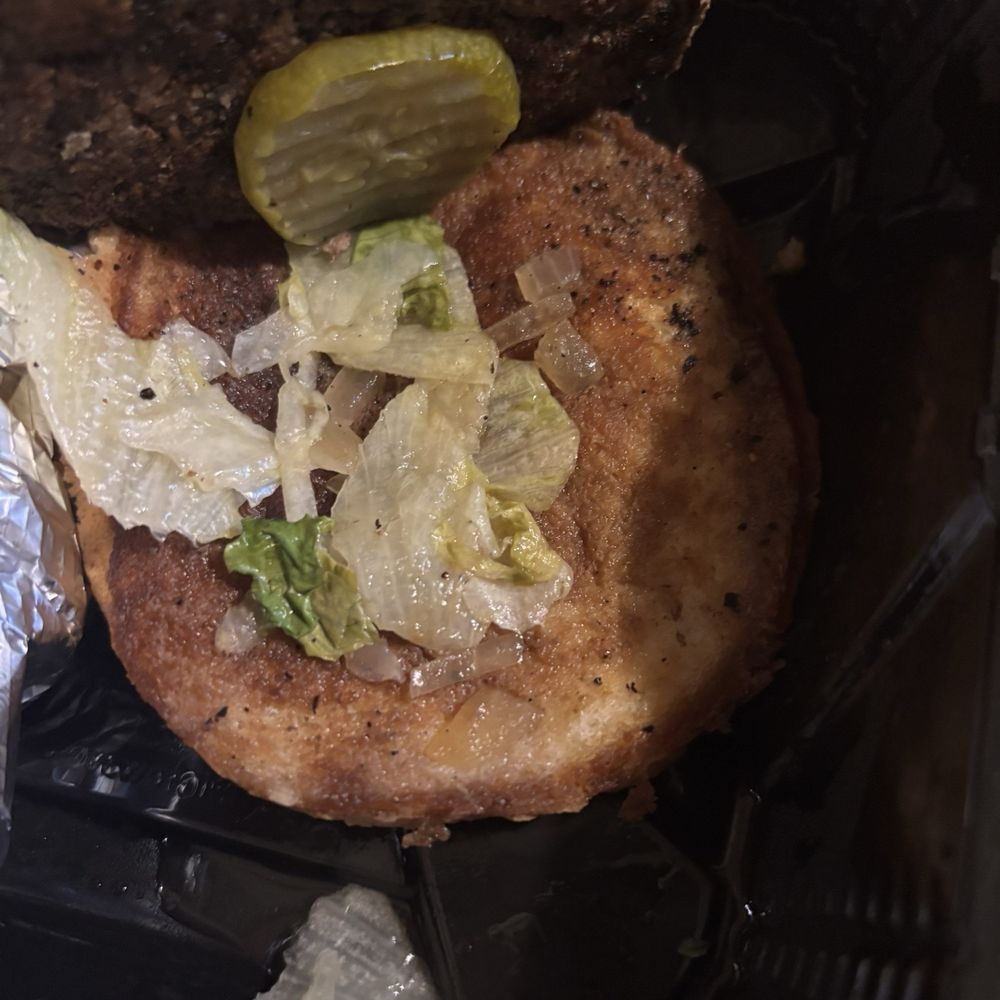 Outback Steakhouse - Soggy wet bun. I asked them to put the condiments on the side. They still put it on the burger. - Steakhouses Near Me - Alexandria, Louisiana