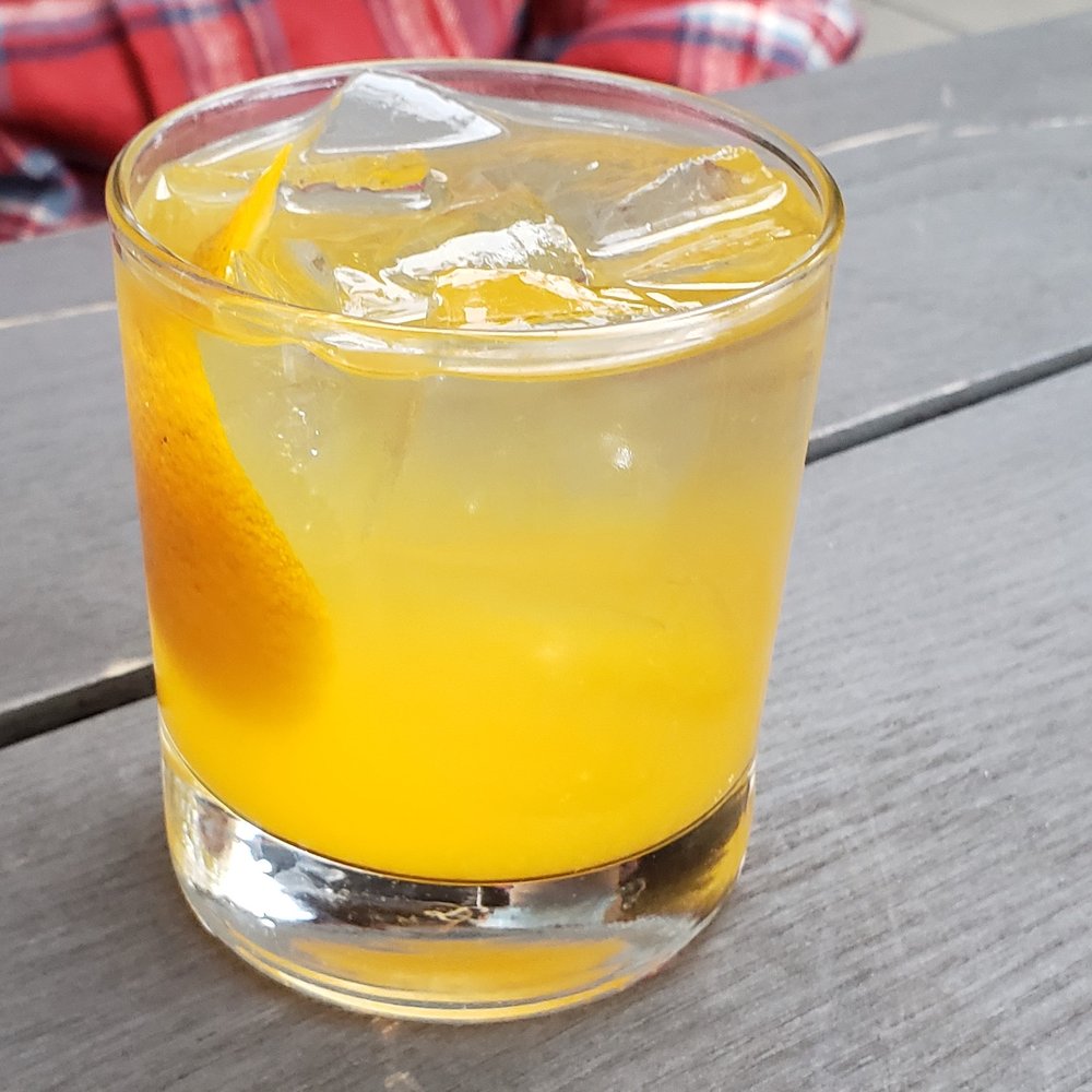 a glass of orange juice a glass of orange juice