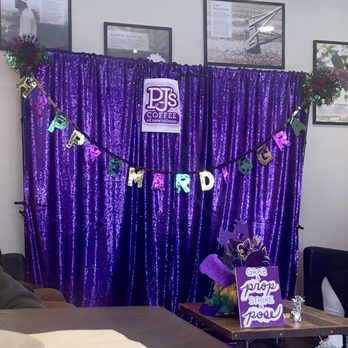 PJ's Coffee - Couches area with some Mardi Gras decor - Coffee & Tea Near Me - Newark, New Jersey