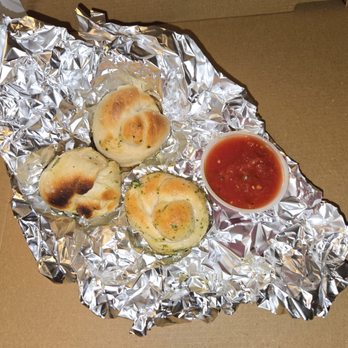 Champion Pizza - Garlic knots with marinara sauce - Pizza Near Me - Flushing, New York Champion Pizza - Garlic knots with marinara sauce - Pizza Near Me - Flushing, New York