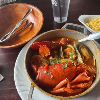The Pearl - Mariscada. Variety of seafood with very tasty broth and rice on the side. Clamps, shrimp, lobster. - Portuguese Near Me - Taunton, Massachusetts The Pearl - Mariscada. Variety of seafood with very tasty broth and rice on the side. Clamps, shrimp, lobster. - Portuguese Near Me - Taunton, Massachusetts