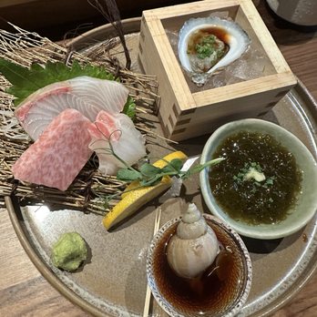 Ichijiku Sushi - My favorite: seaweed salad, snail, oyster and sashimi - Sushi Bars Near Me - Houston, Texas