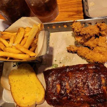Chili's - Half -rack BBQ ribs , Crispers, fries and bread. The street corn is missing because it made its way to my husband's plate. - Tex-Mex Near Me - Modesto, California Chili's - Half -rack BBQ ribs , Crispers, fries and bread. The street corn is missing because it made its way to my husband's plate. - Tex-Mex Near Me - Modesto, California