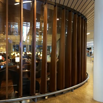 KLM Crown Lounge 52 - The new circular smoking area at KLM lounge 25, seen from the outside. - Airport Lounges Near Me - Schiphol, New Hampshire KLM Crown Lounge 52 - The new circular smoking area at KLM lounge 25, seen from the outside. - Airport Lounges Near Me - Schiphol, New Hampshire