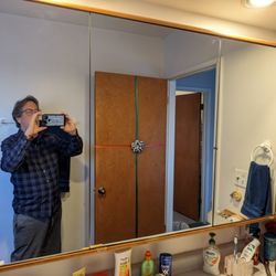 Angel's Glass & Mirror - Three mirror panels mounted on custom wood backings.
