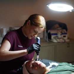 Ruth offering a microneedling treatment with Skinpen