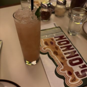 Nonno's - This is one of their signature drinks. "Oh Bee-Have" Gin, White Peach, Lemon, Basil. Very good. A1. - Pizza Near Me - Houston, Texas