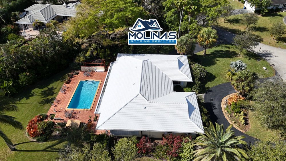 Slide of Molina's Roofing Services