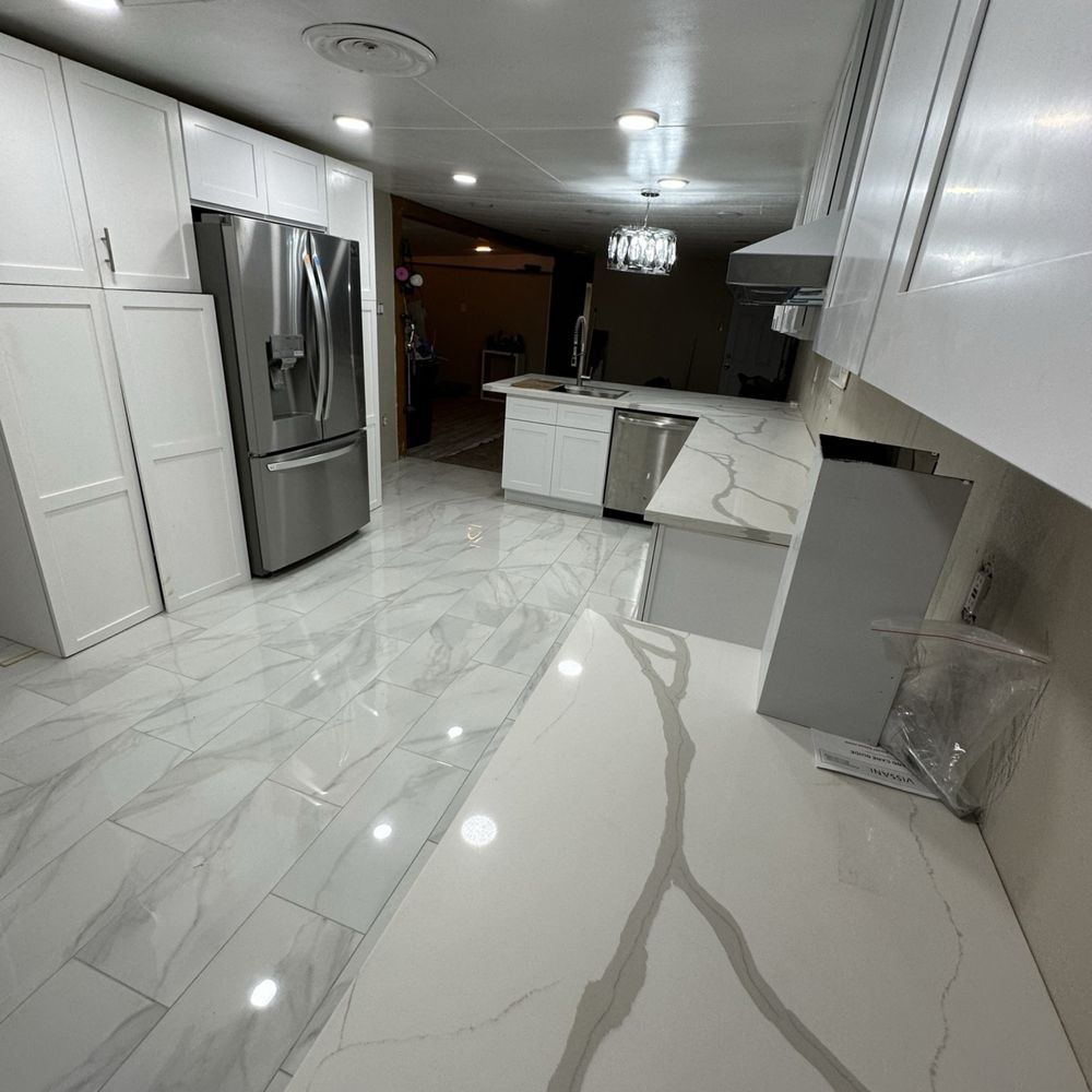 12ONE12 Builder's Group - a kitchen with marble countertops - General Contractors Near Me 12ONE12 Builder's Group - a kitchen with marble countertops - General Contractors Near Me