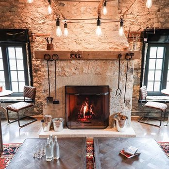 Spring Mill Distillery - a fireplace in the lounge area - Distilleries Near Me - Guelph, Ontario