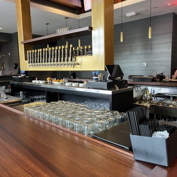 Lord Hobo - a bar with a lot of glasses on the counter - Beer Bar Near Me - Boston, Massachusetts