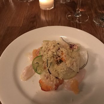 L'Oursin - petrale sole carpaccio with whitefish caviar, radishes, sea urchin butter + herbs - French Near Me - Seattle, Washington